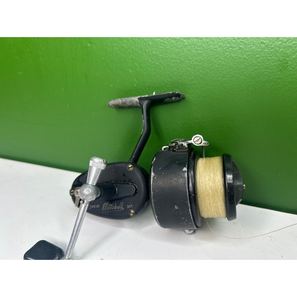 Vintage Garcia Mitchell 301 Spinning Fishing Reel Black Left Hand Retrieve